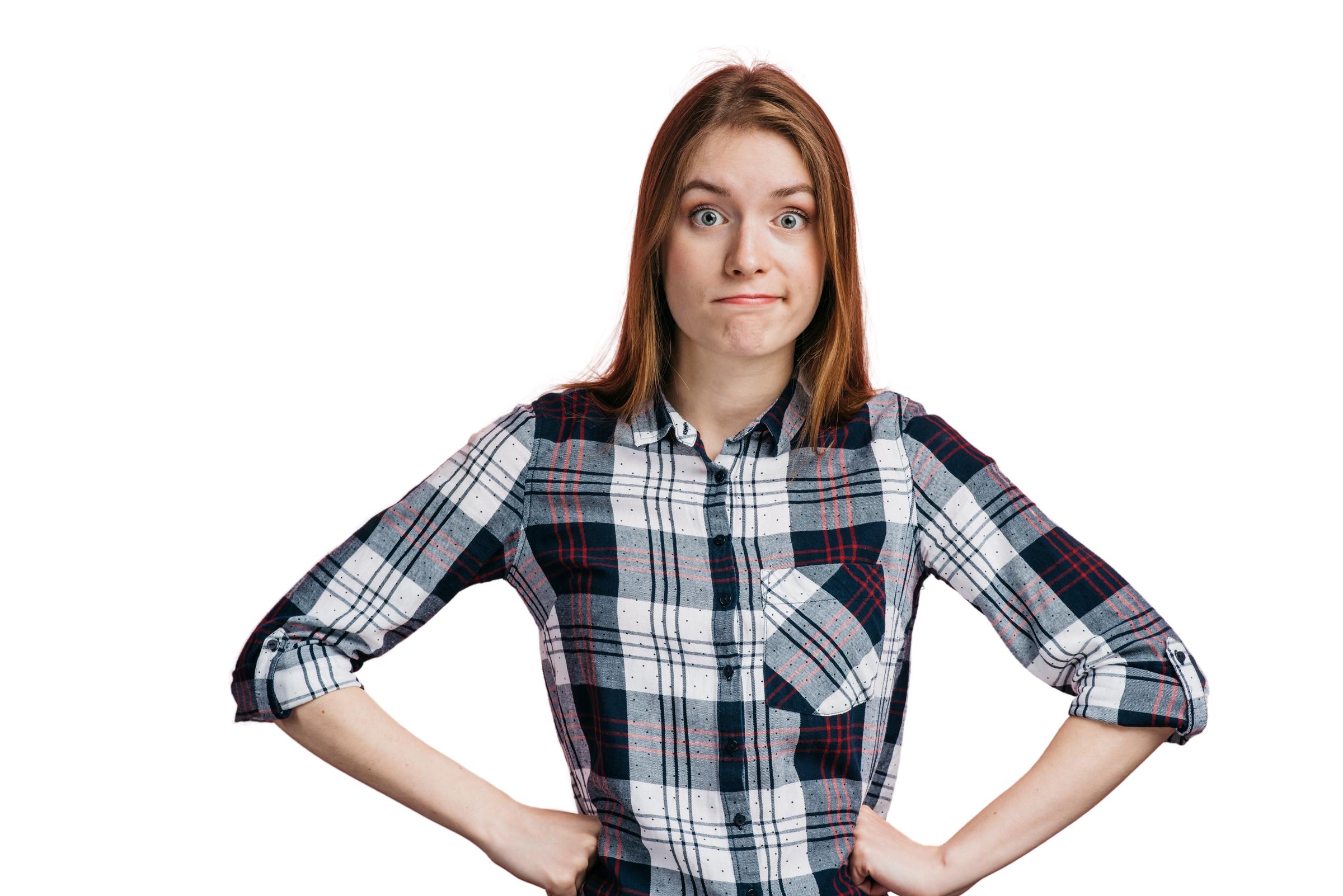 A woman smirking | Source: Freepik