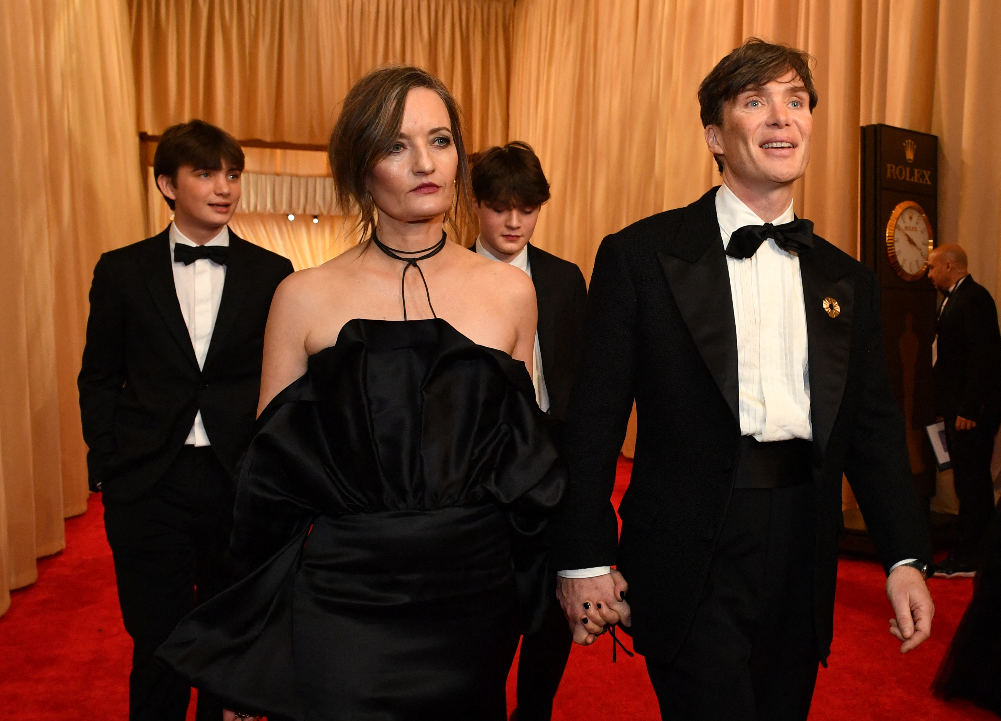 Cillian Murphy arrives with his wife, Yvonne McGuinness, and their sons, Aran and Malachy Murphy, at the 96th Annual Academy Awards at the Dolby Theatre on March 10, 2024, in Hollywood, California. | Source: Getty Images