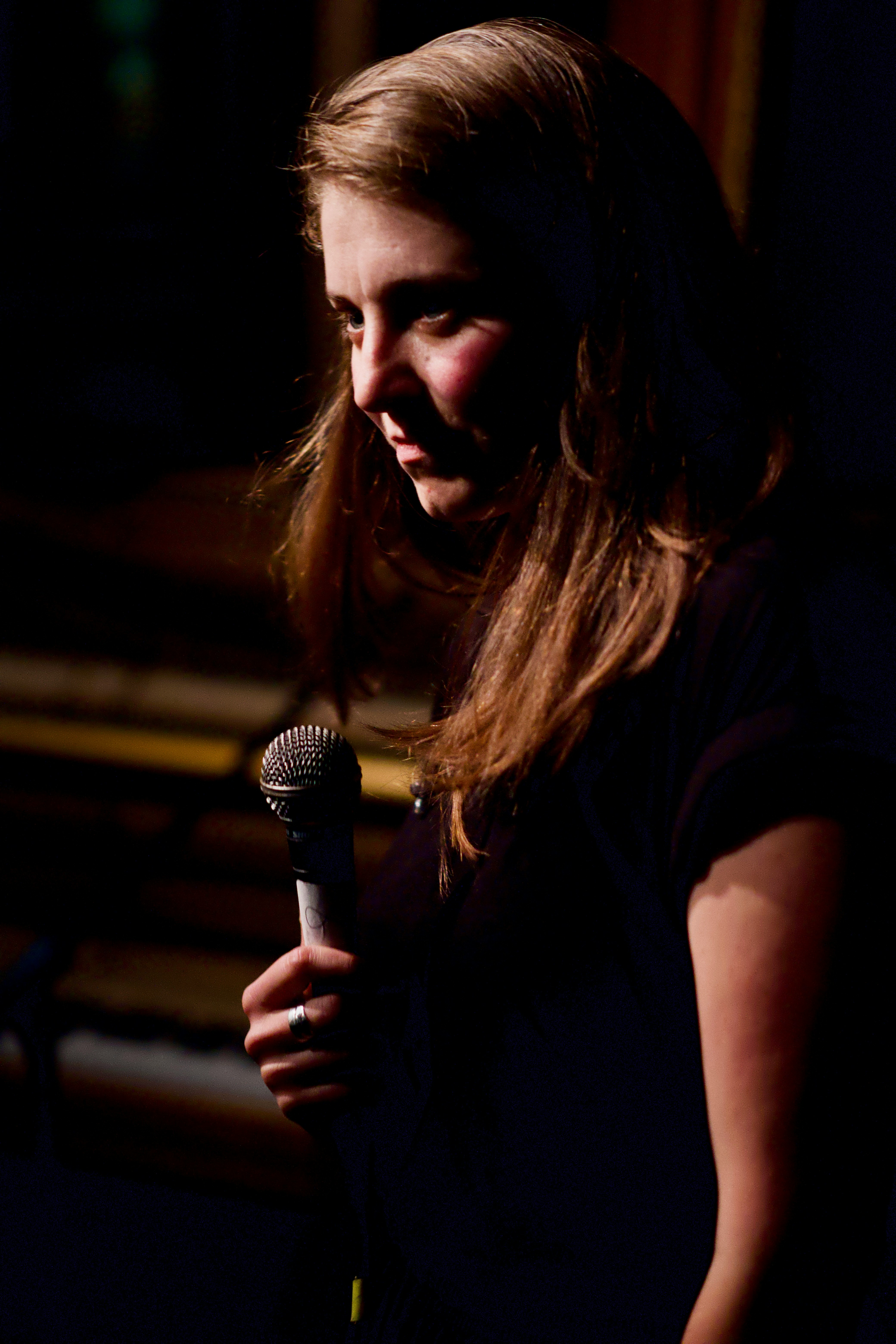 A woman holding a microphone | Source: Unsplash