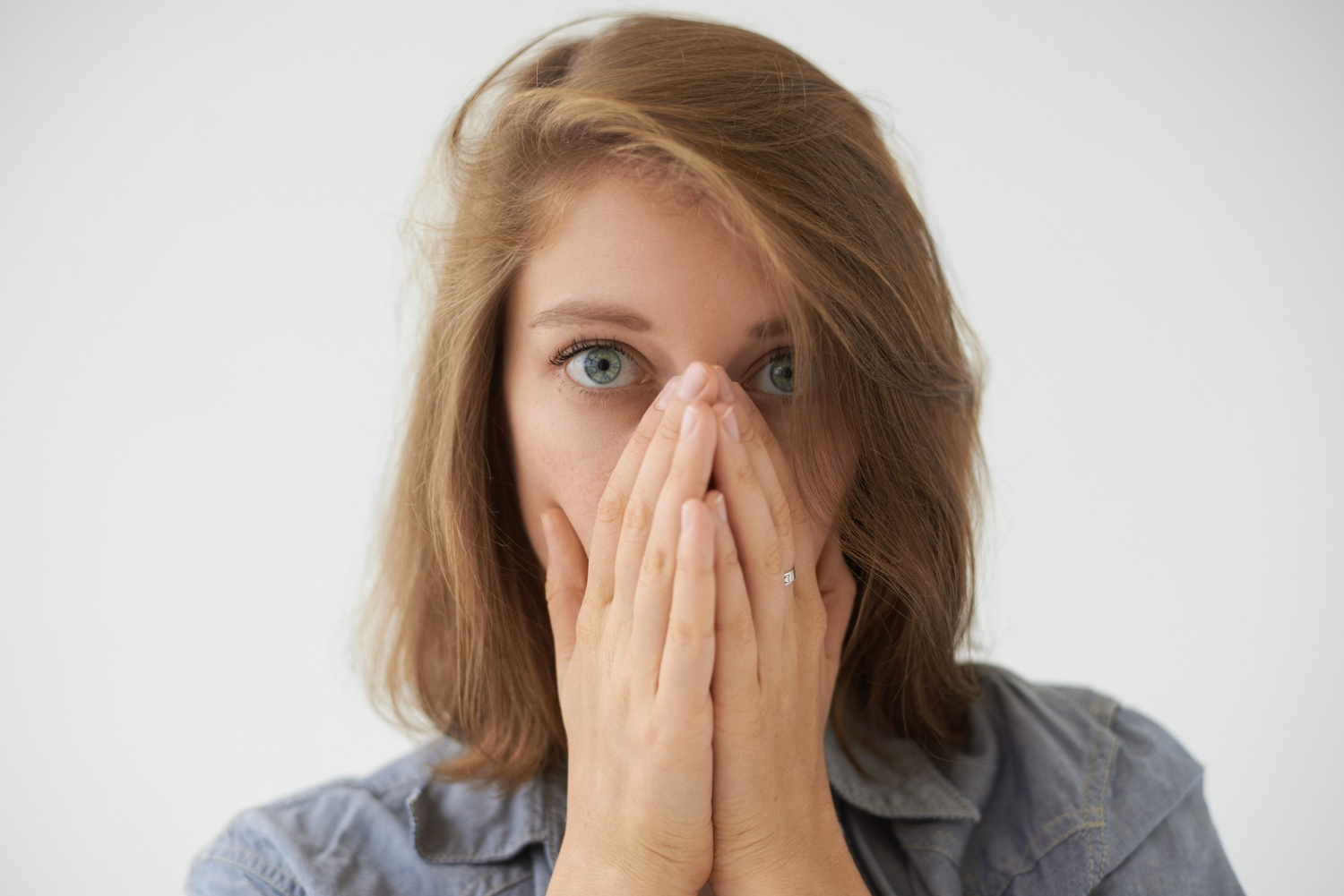 A shocked woman | Source: Freepik