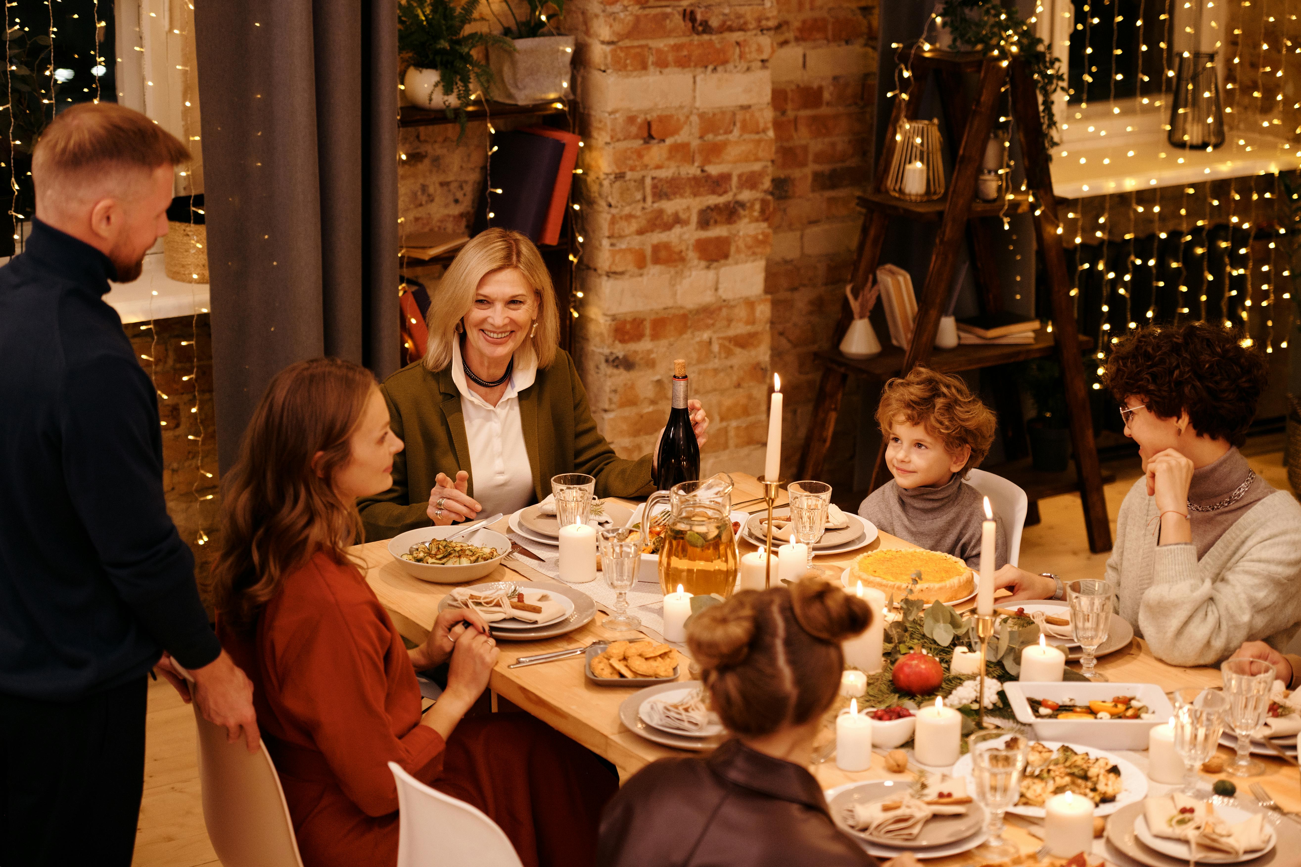 A family celebrating Christmas dinner | Source: Pexels