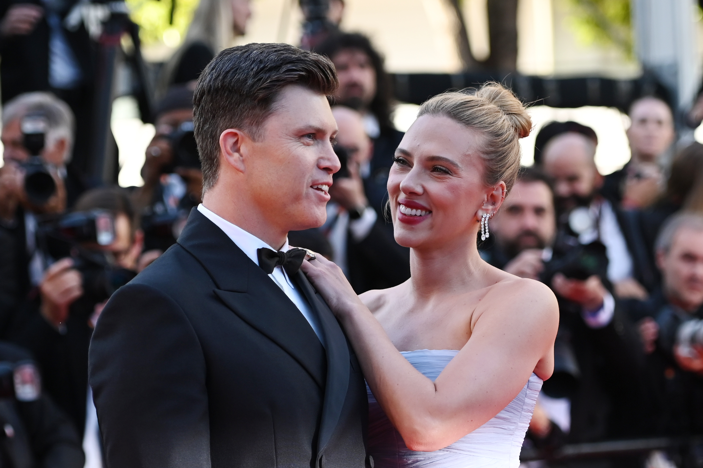 Scarlett Johansson and Colin Jost arrive at the premiere of the film "Vie Privée" (A Private Life) on the red carpet at the 78th Cannes International Film Festival. | Source: Getty Images