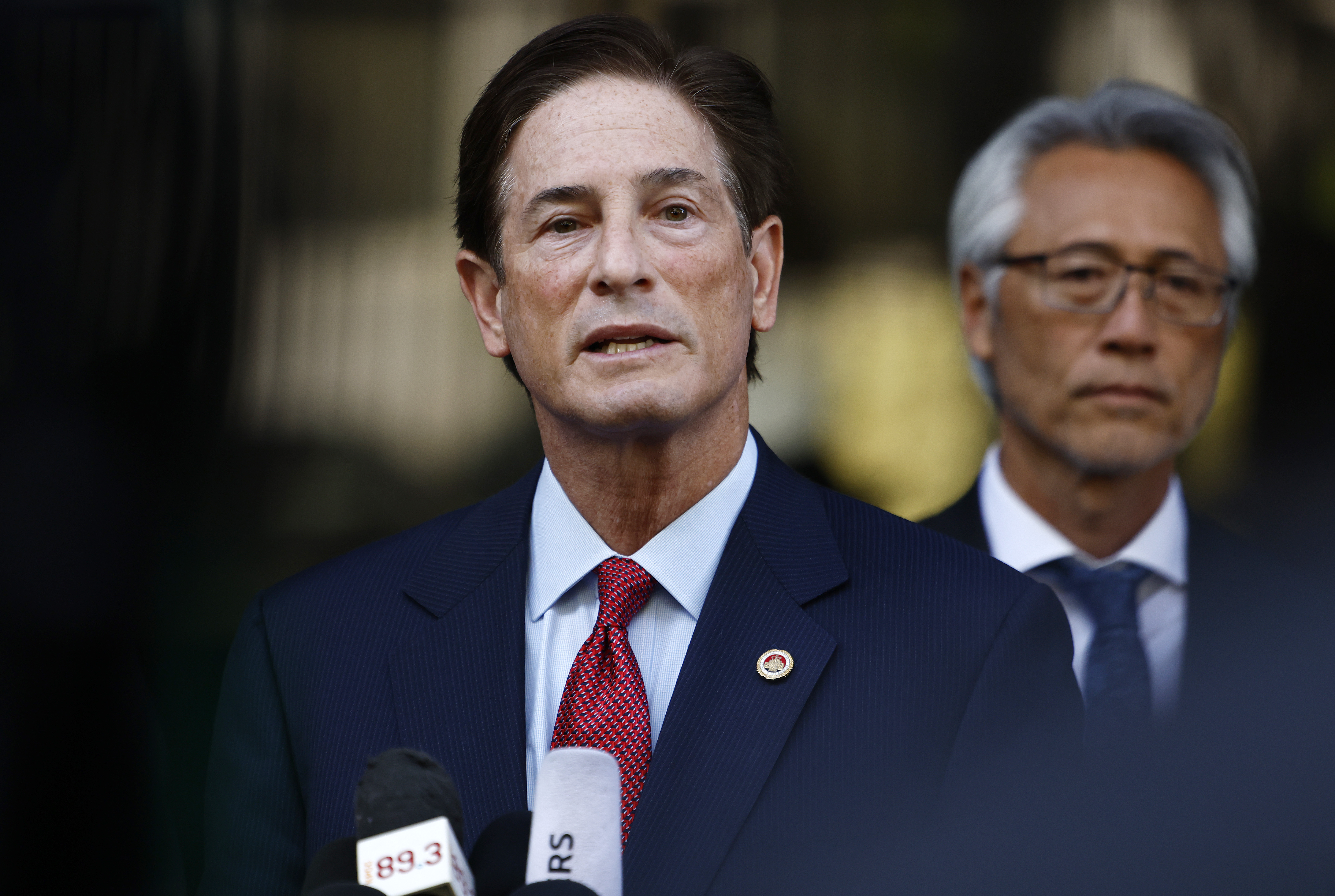 Los Angeles County District Attorney Nathan Hochman speaks to the media after Nick Reiner's arraignment in Los Angeles County Superior Court on February 23, 2026 | Source: Getty Images