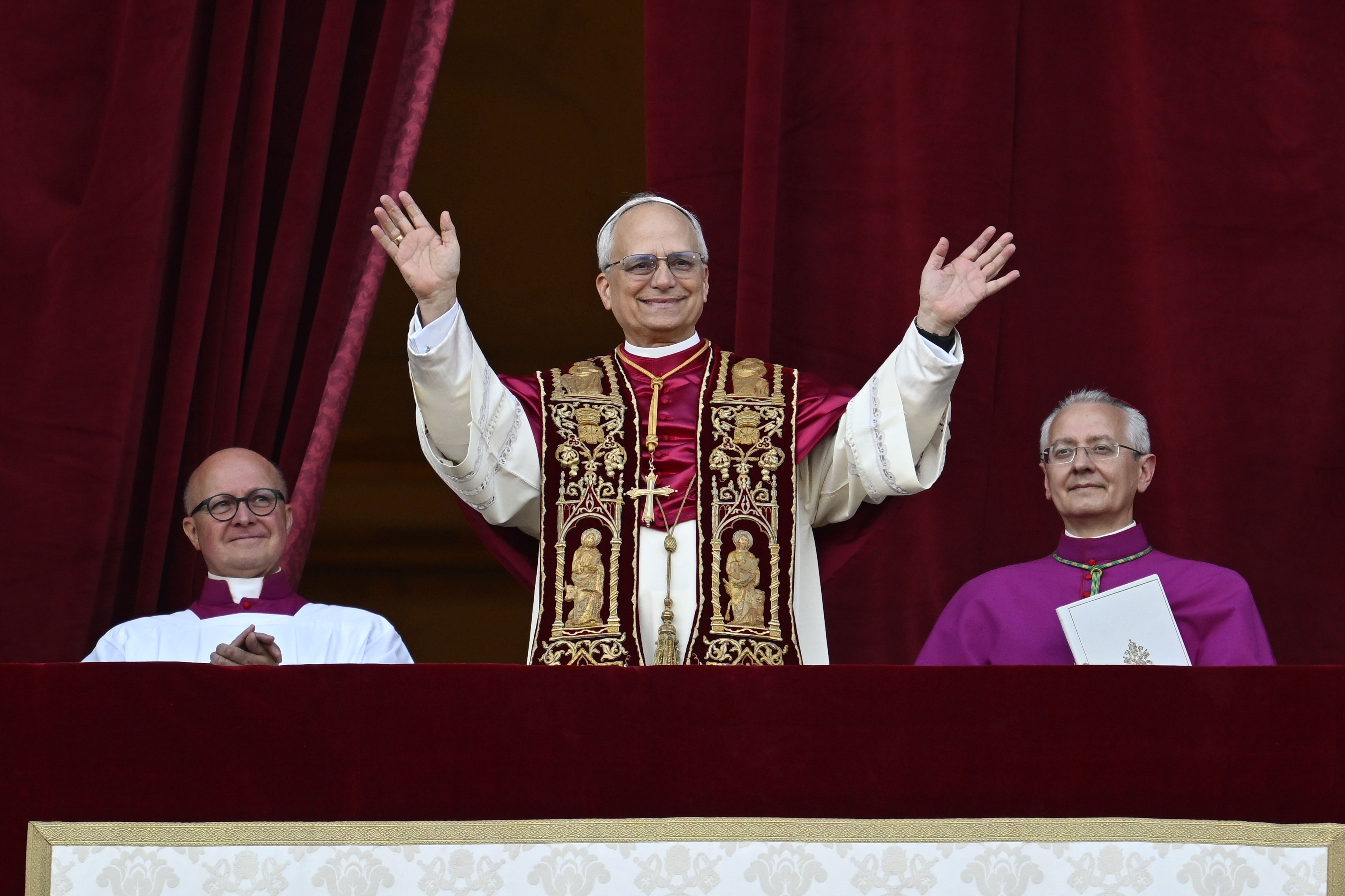 Newly elected Pope Leo XIV, Robert Prevost, arrives on the main central loggia balcony of the St Peter's Basilica for the first time, after the cardinals ended the conclave, in The Vatican, on May 8, 2025. | Source: Getty Images