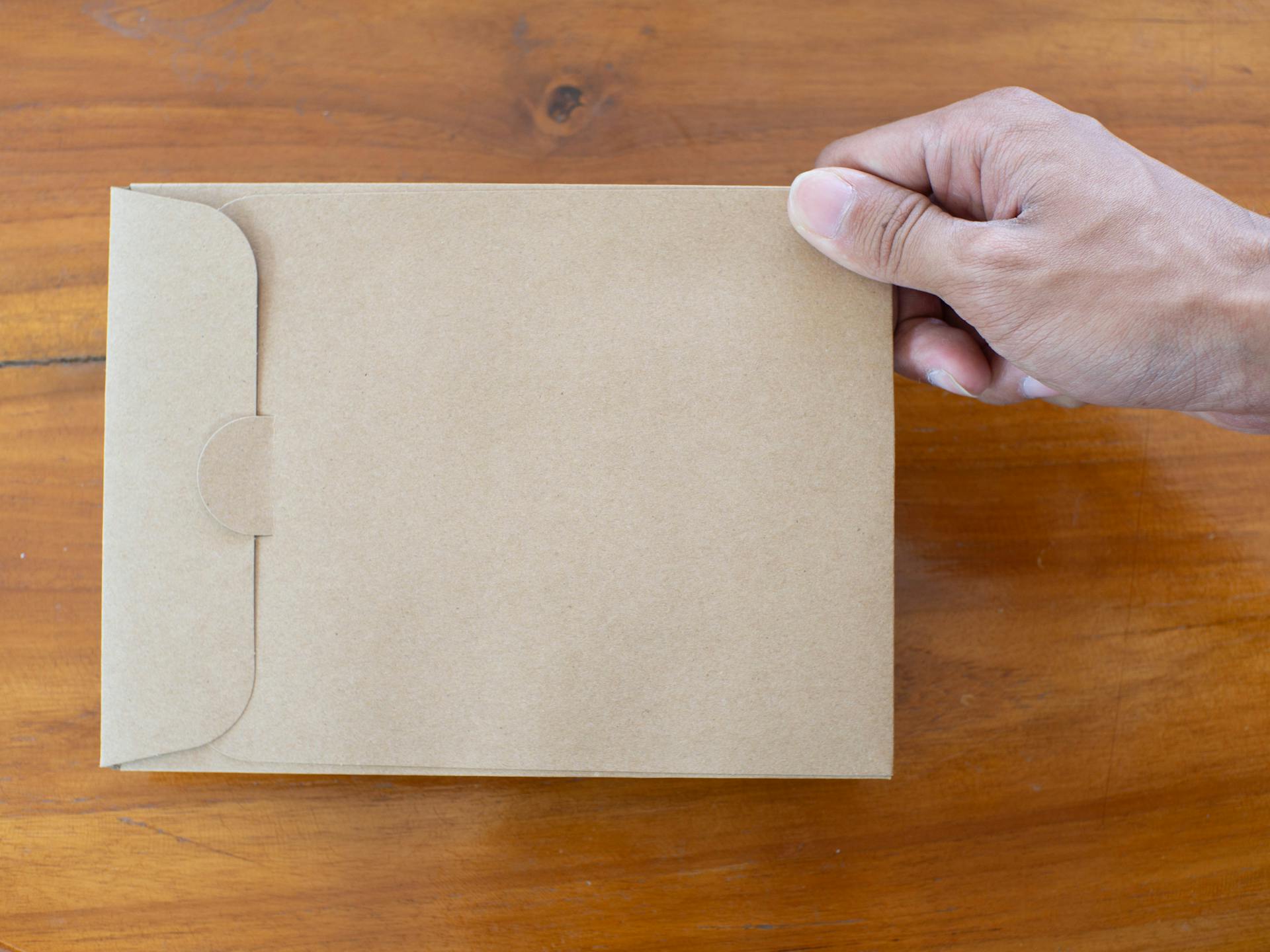 An envelope with a document | Source: Pexels