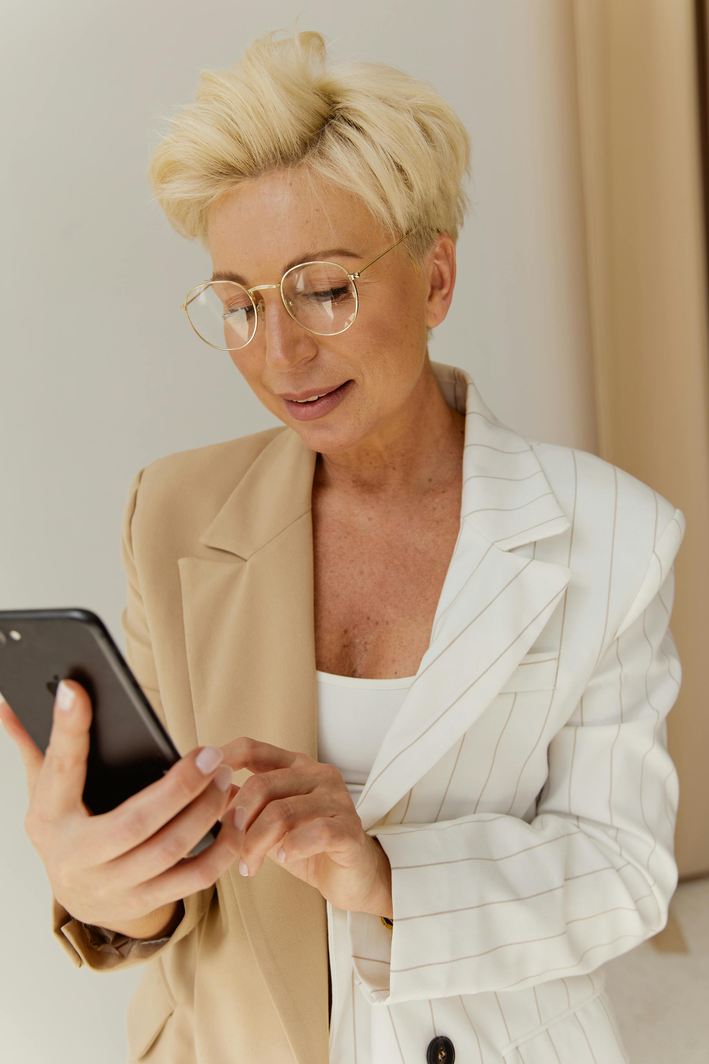 My MIL Demanded I Leave My Own Home During the Birthday Party I Organized for Her – She Didn't Know How Big a Mistake That Was 16 A woman using her phone | Source: Pexels