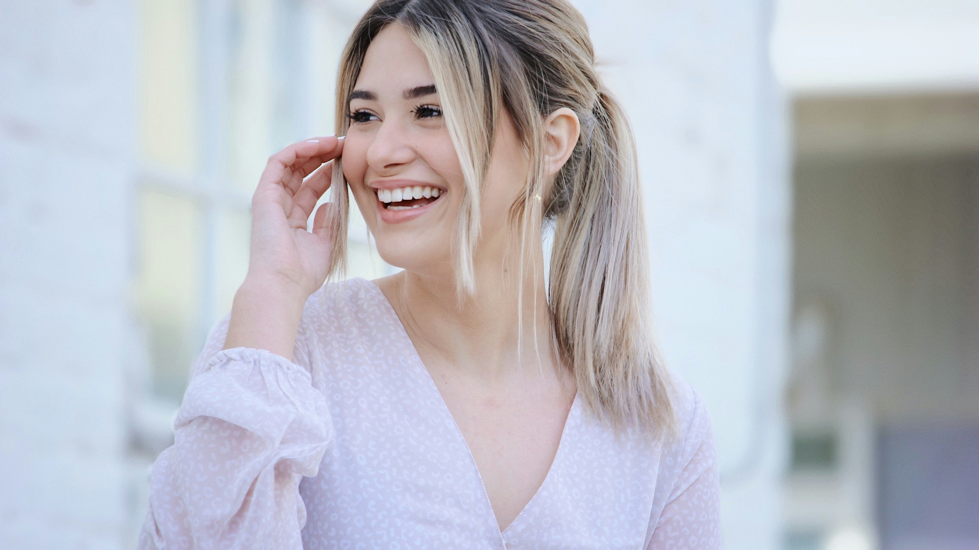 A smiling woman | Source: Unsplash