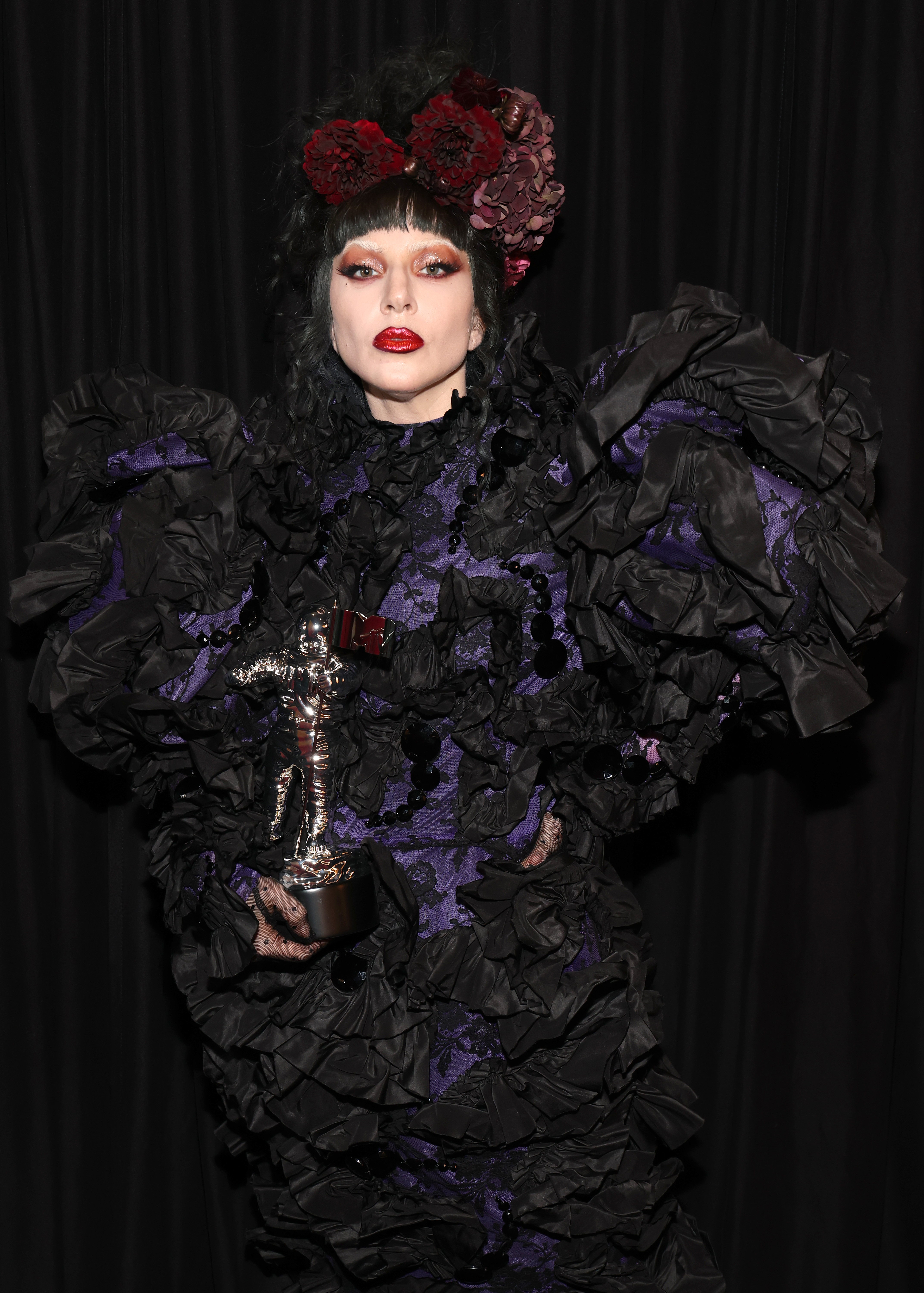 Lady Gaga poses with the Artist of the Year award during the 2025 MTV Video Music Awards at UBS Arena on September 7, 2025, in Elmont, New York. | Source: Getty Images