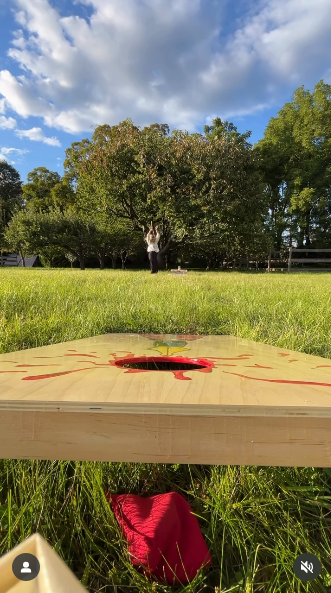 Kyra Sedgwick playing the game of cornhole from a video posted on September 4, 2025 | Source: Instagram/kevinbacon