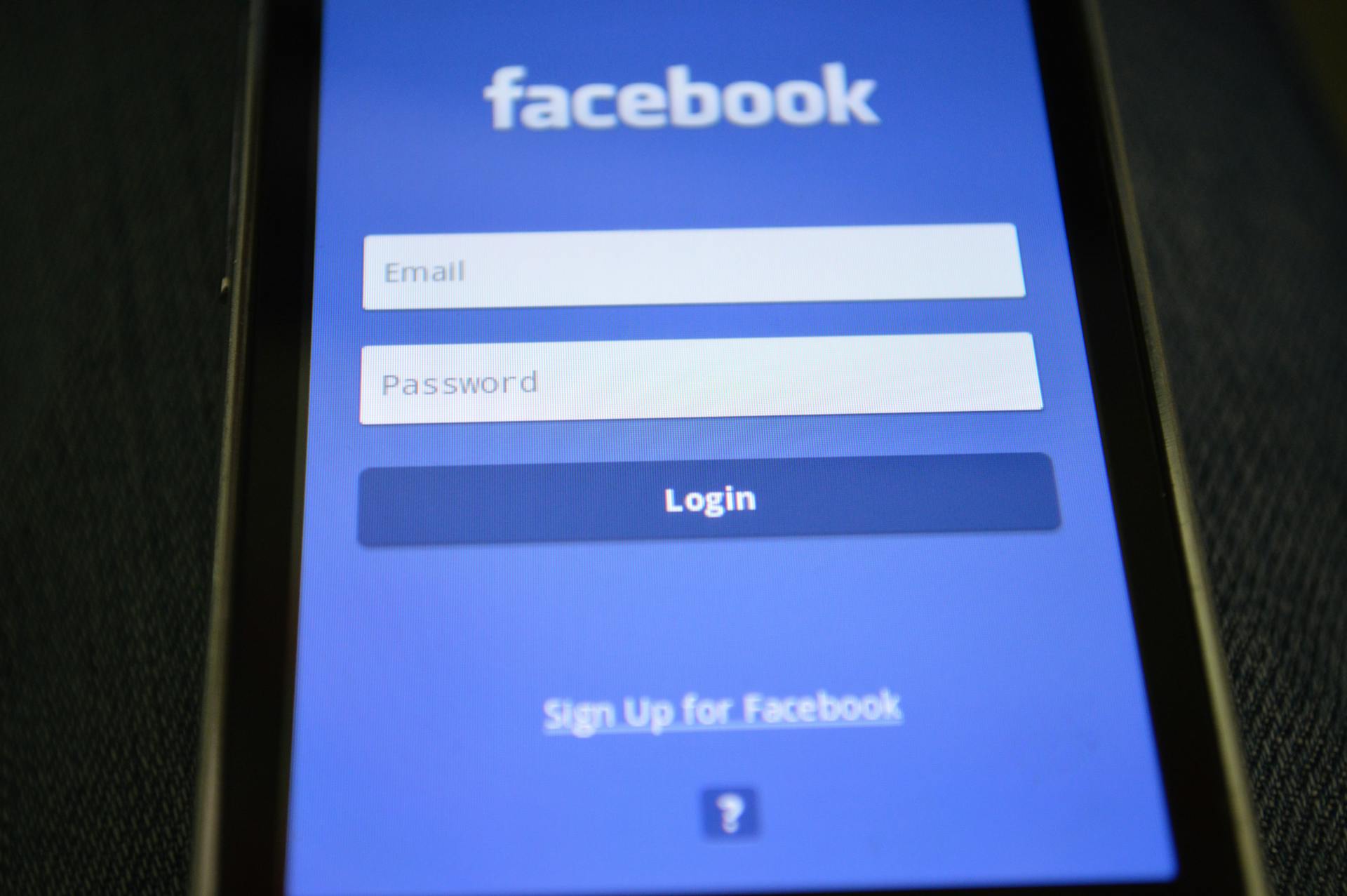 Facebook's log-in screen on a phone | Source: Pexels