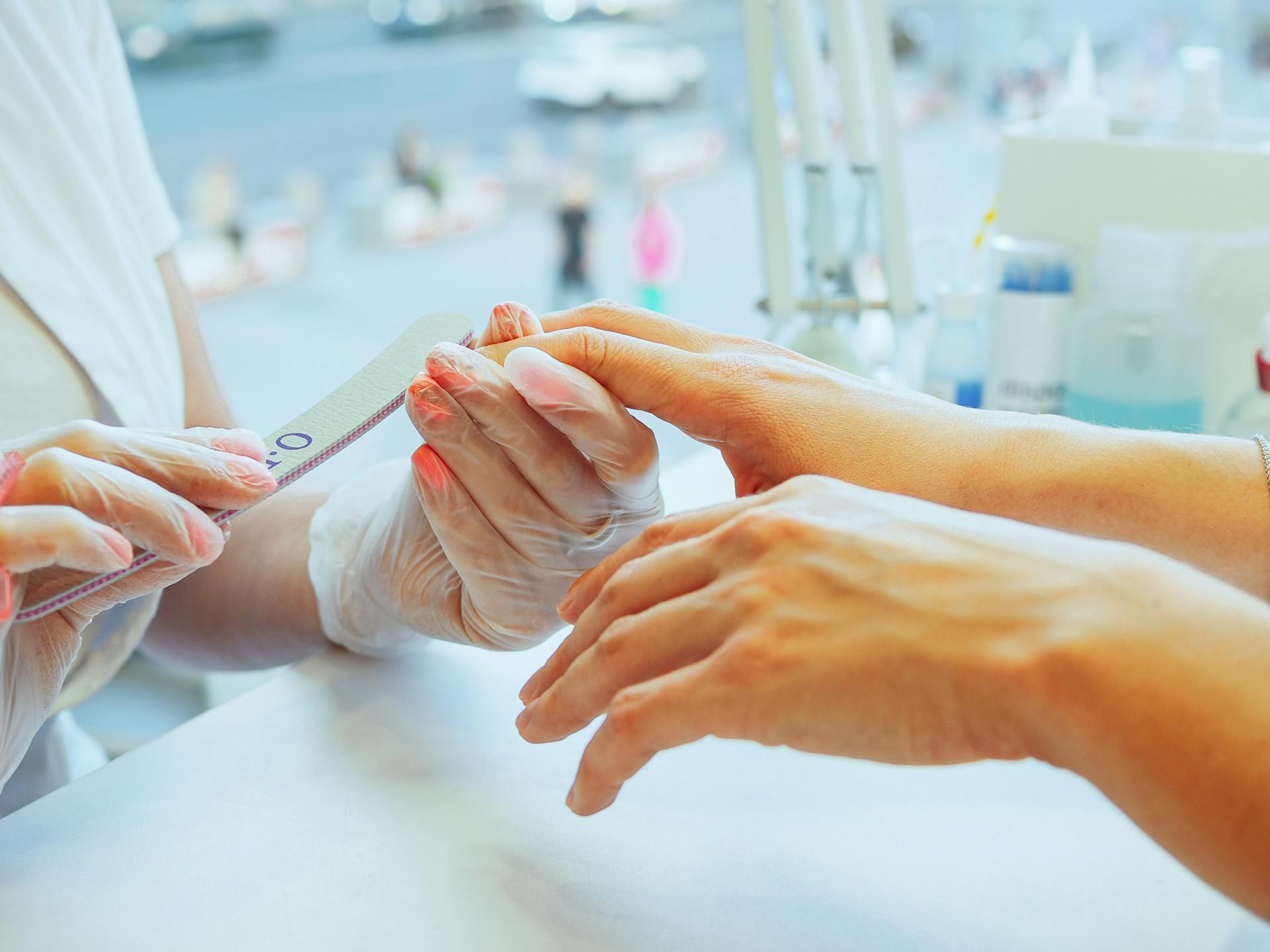 A woman doing a manicure | Source: Pexels