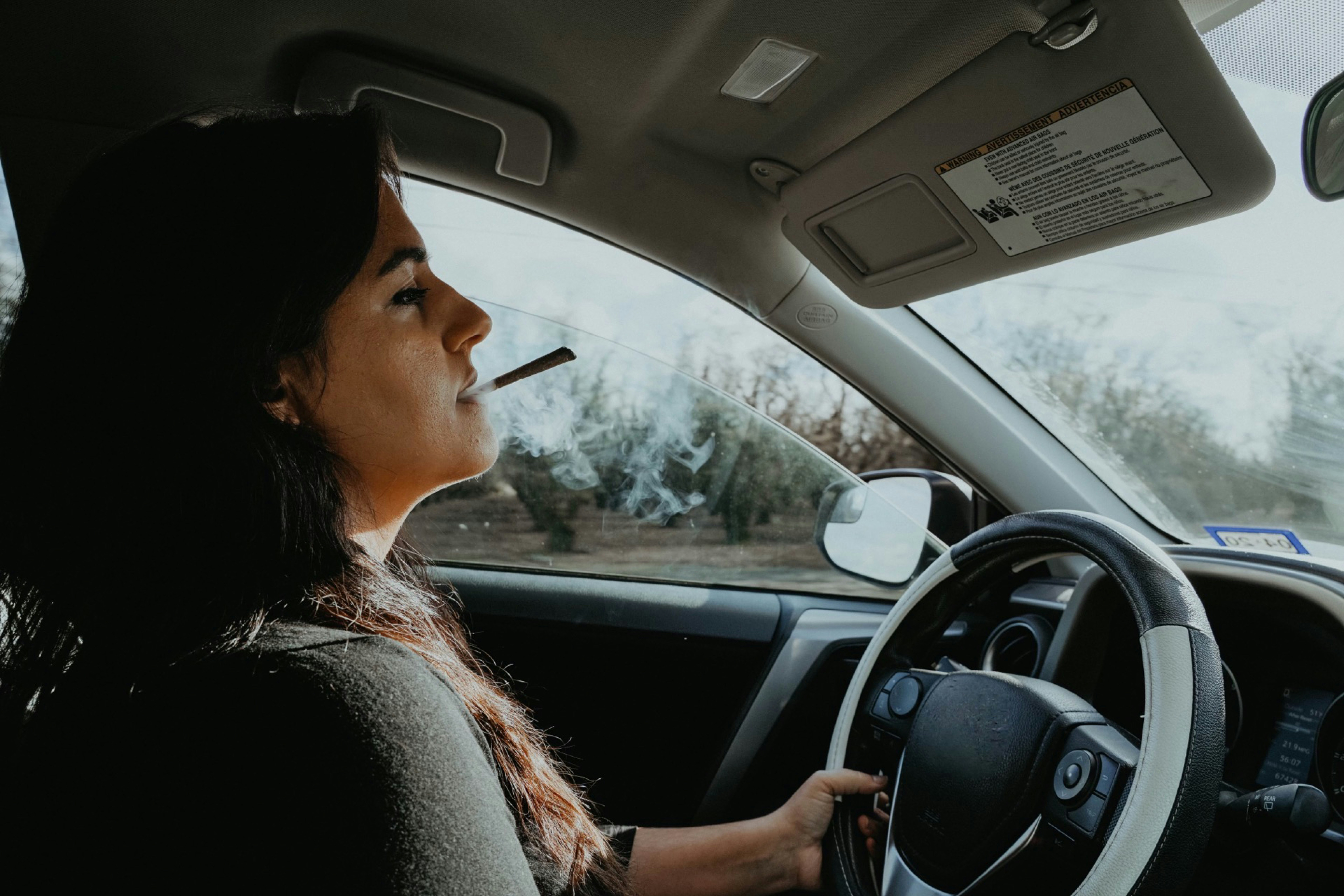 A woman driving a car | Source: Unsplash
