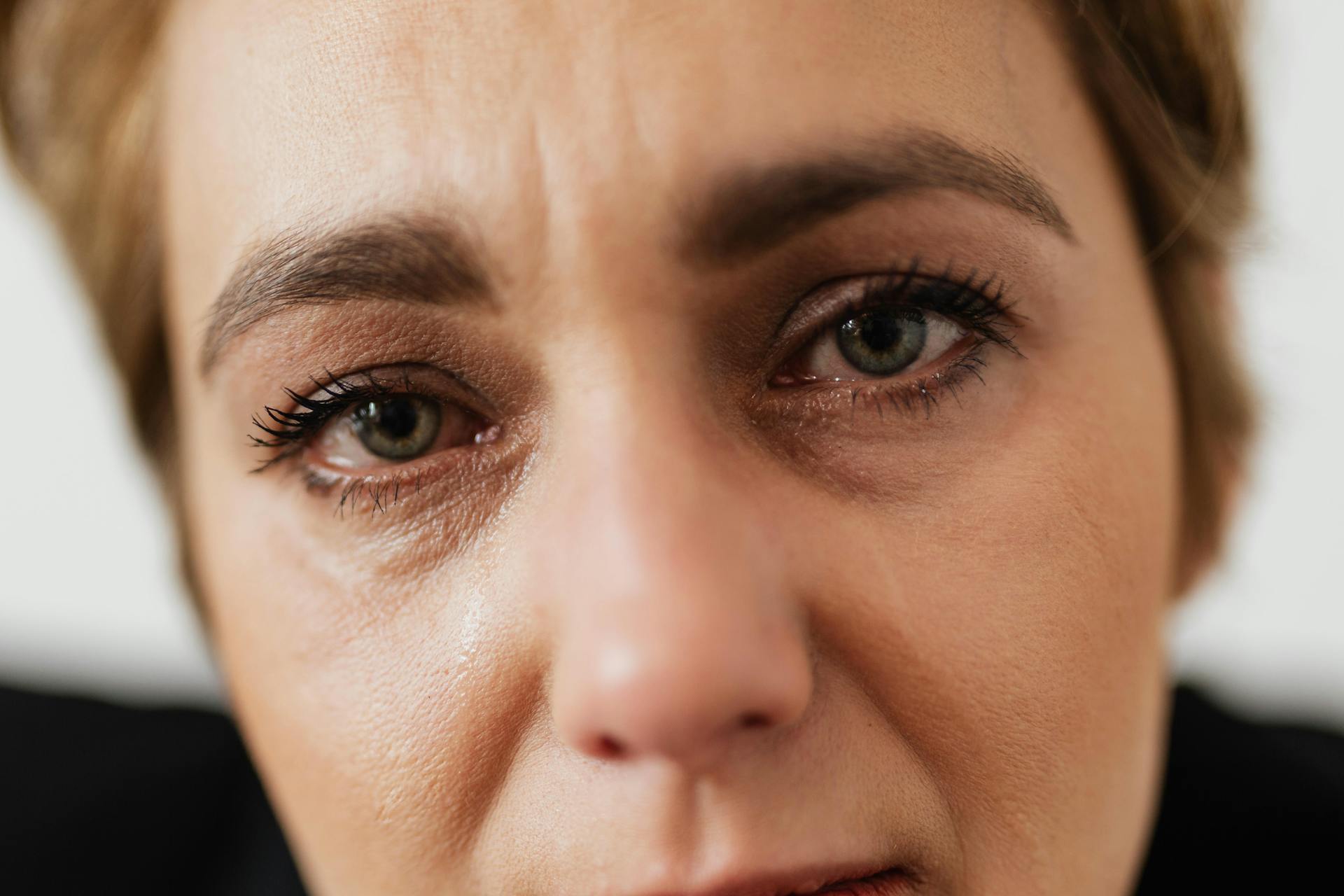A woman with tears in her eyes | Source: Pexels