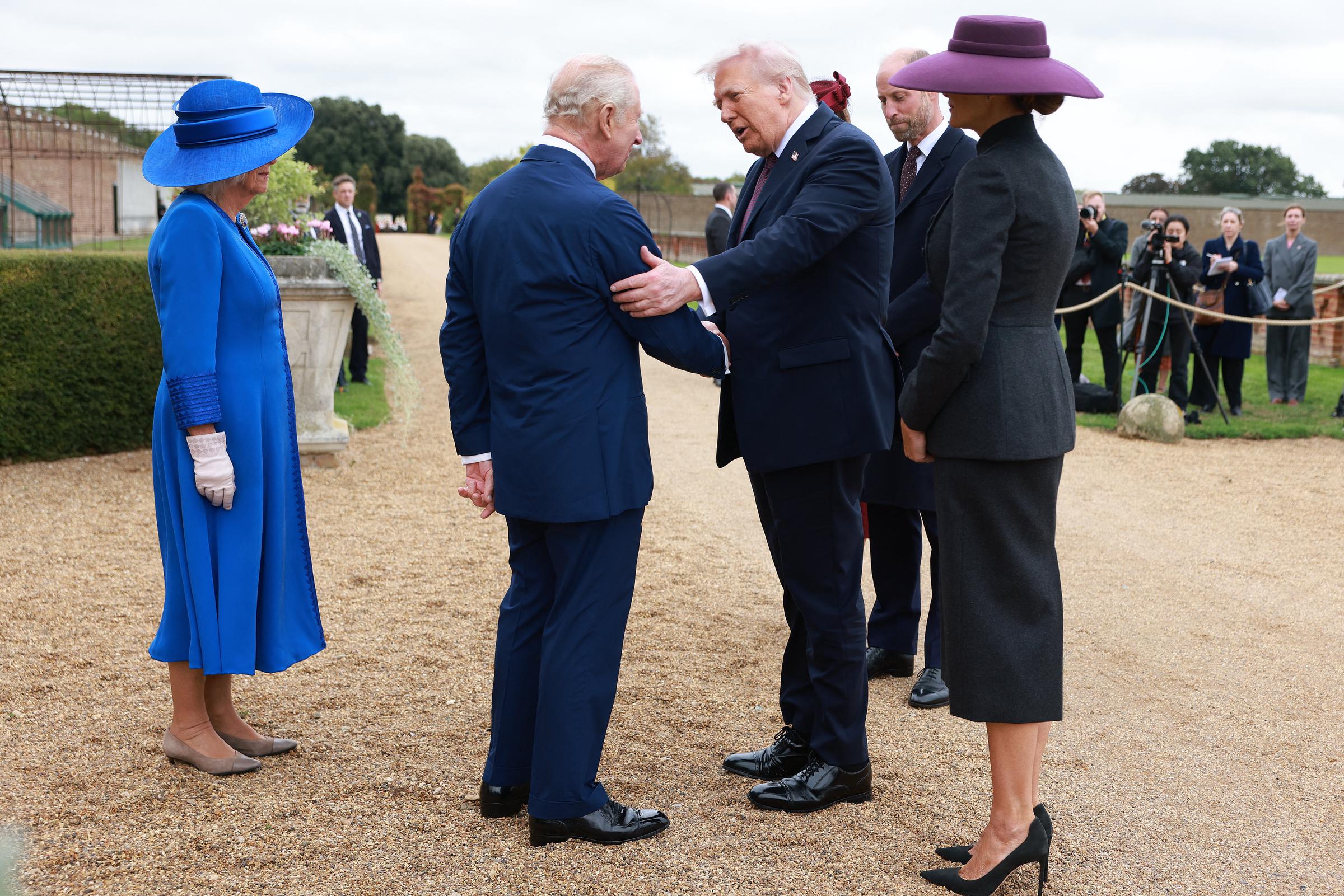 King Charles III and Queen Camilla greet U.S. President Donald Trump and First Lady Melania Trump, accompanied by Prince William, Prince of Wales, and Catherine, Princess of Wales, upon their arrival in the grounds of Windsor Castle, in Windsor, on September 17, 2025, for the start of a second State Visit. | Source: Getty Images