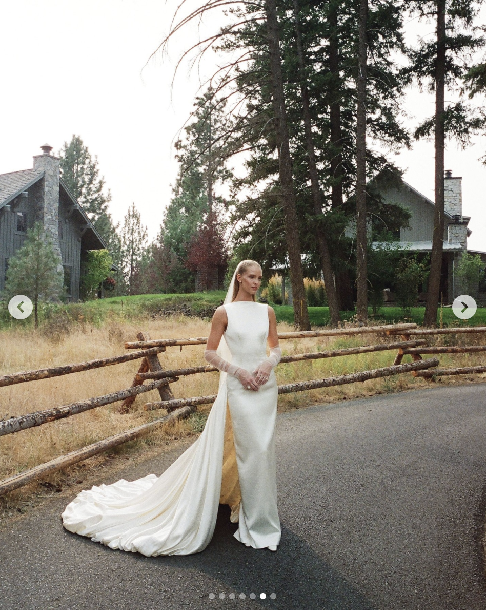 Abby Champion poses for a photo in her wedding gown for her September 6, 2025 wedding to Patrick Schwarzenegger. | Source: Instagram/britishvogue