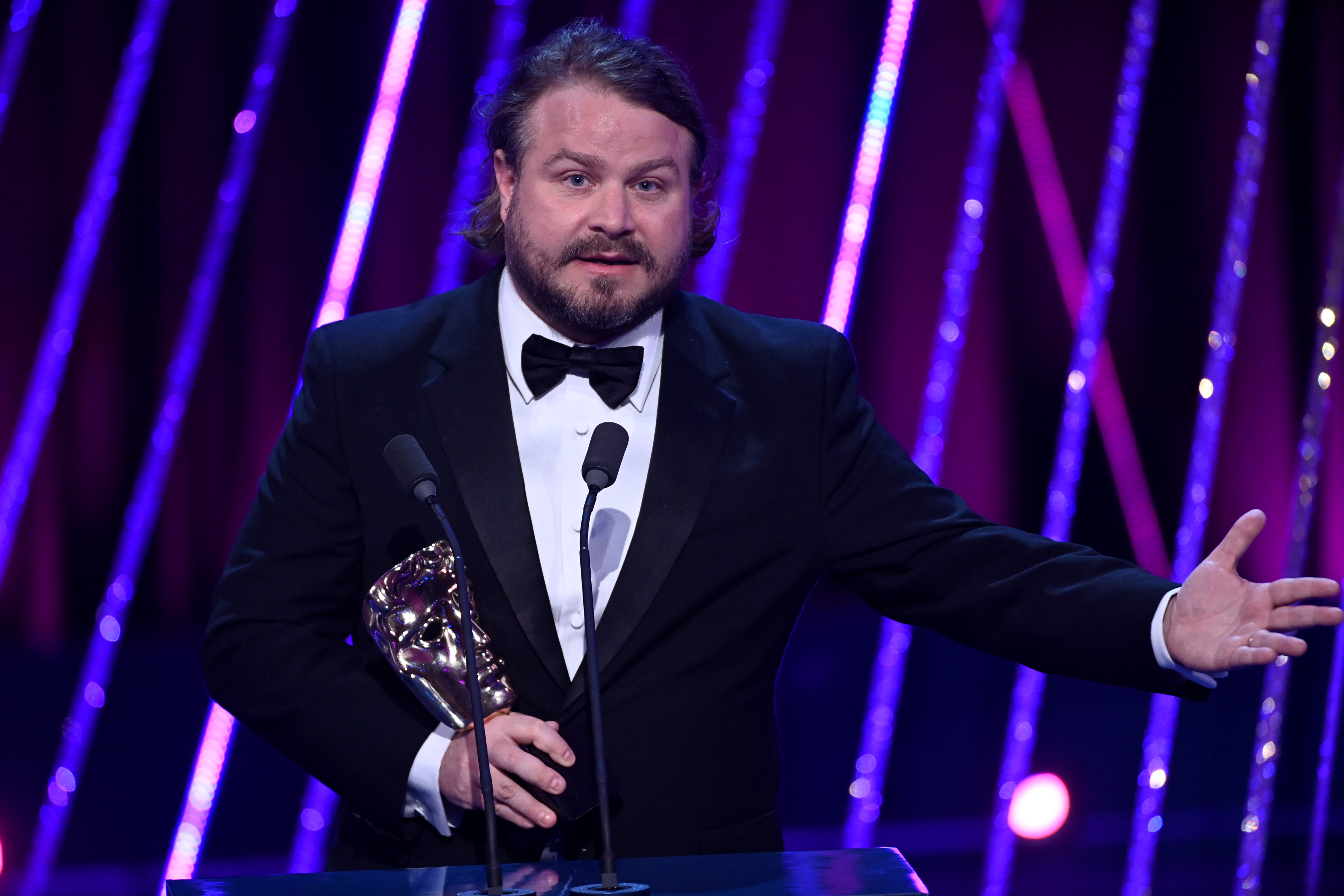 rady Corbet accepts the Director Award for 'The Brutalist' on stage during the EE BAFTA Film Awards 2025 at The Royal Festival Hall on February 16, 2025 in London, England | Source: Getty Images