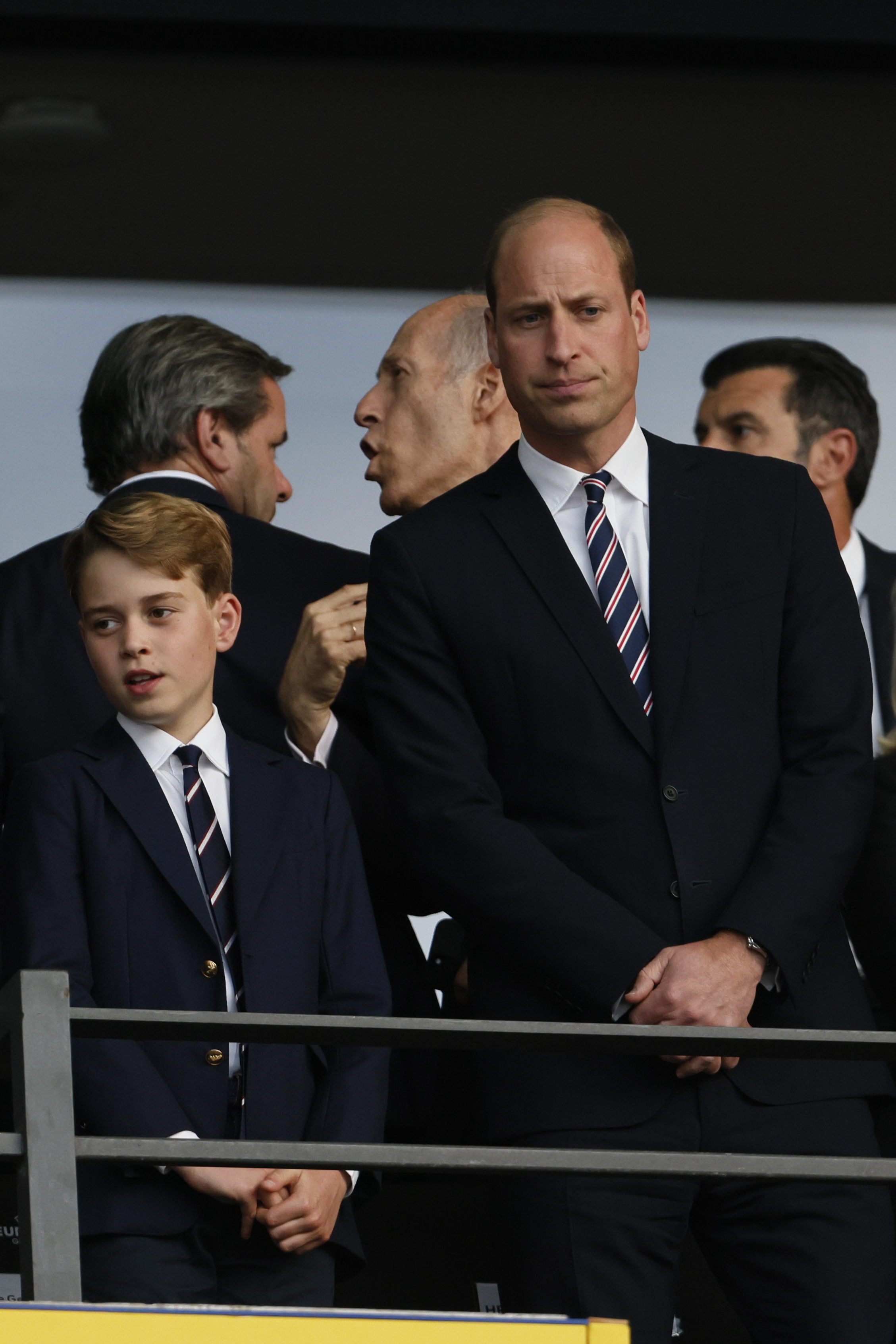 Prince George and Prince William look dejected during the UEFA EURO 2024 final match between Spain and England at Olympiastadion on July 14 in Berlin, Germany. | Source: Getty Images