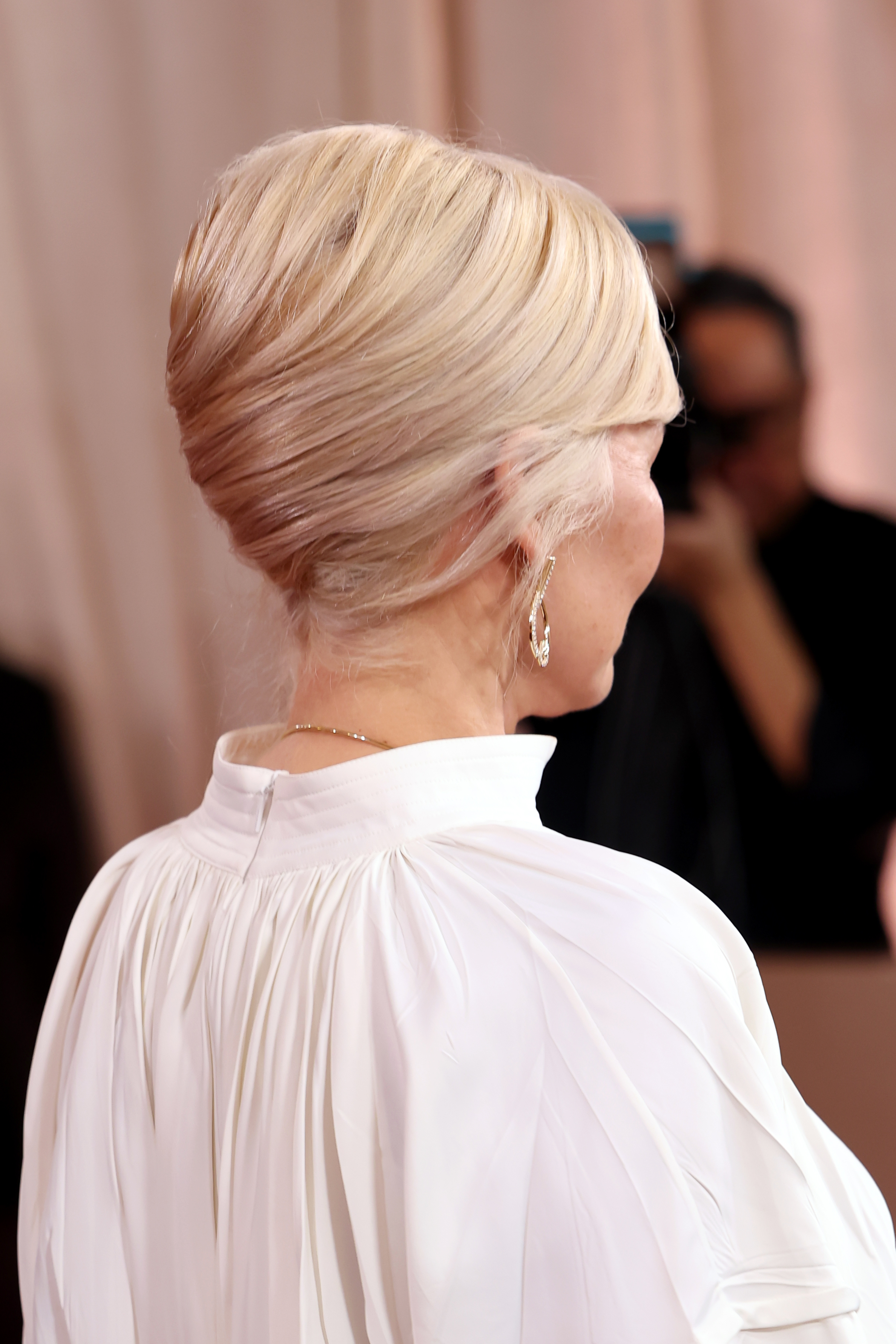 A view of Pamela Anderson's hairstyle from the back at the Golden Globes in January 2026 | Source: Getty Images