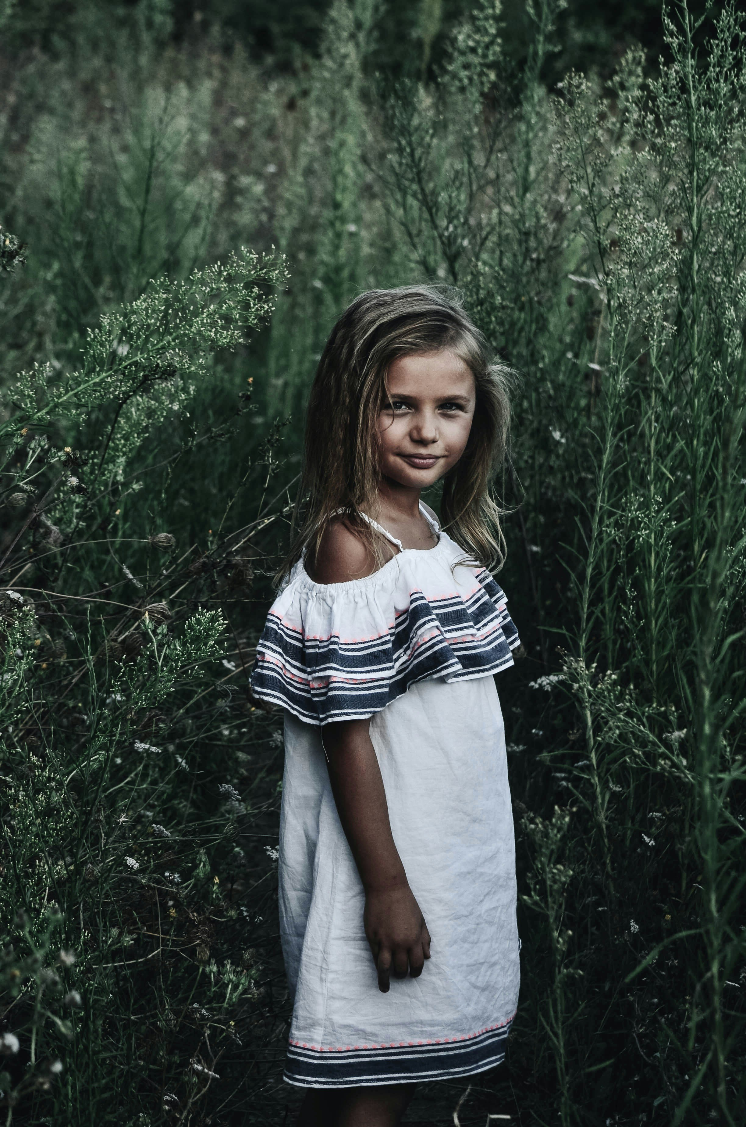 A smiling little girl | Source: Unsplash