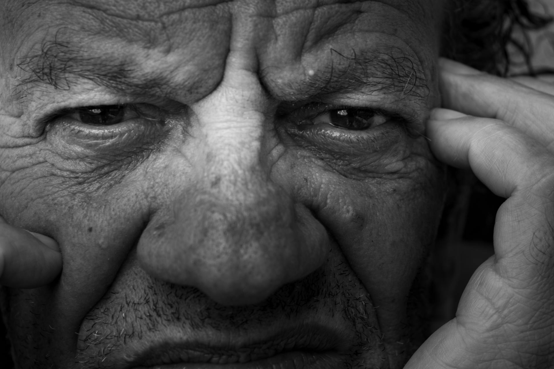 Close up of an angry-looking man's face | Source: Pexels