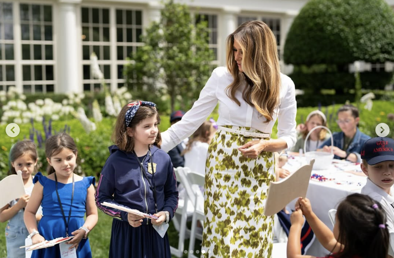 First Lady Melania Trump interacts with a child at the "Take Our Daughters and Sons To Work Day" event at the White House on May 20, 2025 | Source: Instagram/flotus