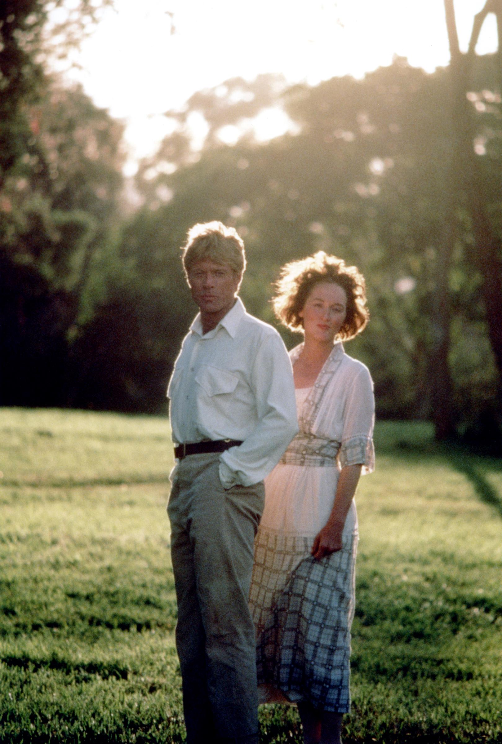 Robert Redford and Meryl Streep on the set of Out of Africa based on the book by Karen Blixen and Judith Thurman, circa 1985. | Source: Getty Images