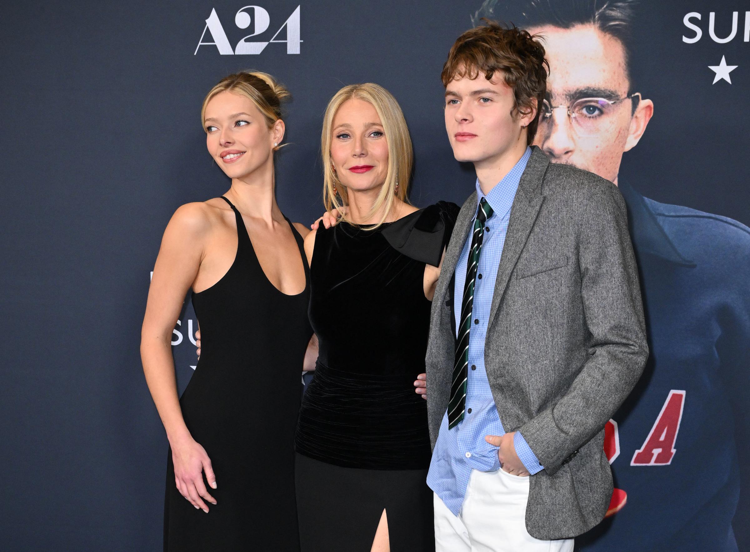 Gwyneth Paltrow and her children Apple Martin and Moses Martin attend the NY premiere of "Marty Supreme" in New York on December 16, 2025. | Source: Getty Images