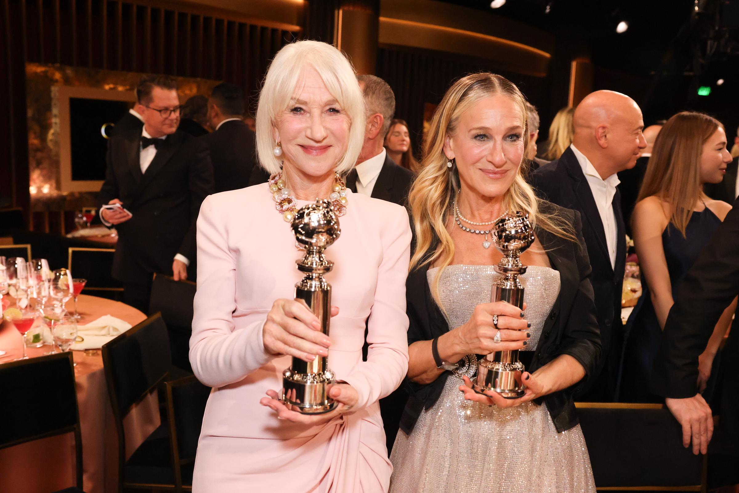 Sarah Jessica Parker and Helen Mirren at the Golden Eve: The Golden Globes Honor Helen Mirren & Sarah Jessica Parker held at The Beverly Hilton on January 06, 2026 in Beverly Hills, California. | Source: Getty Images