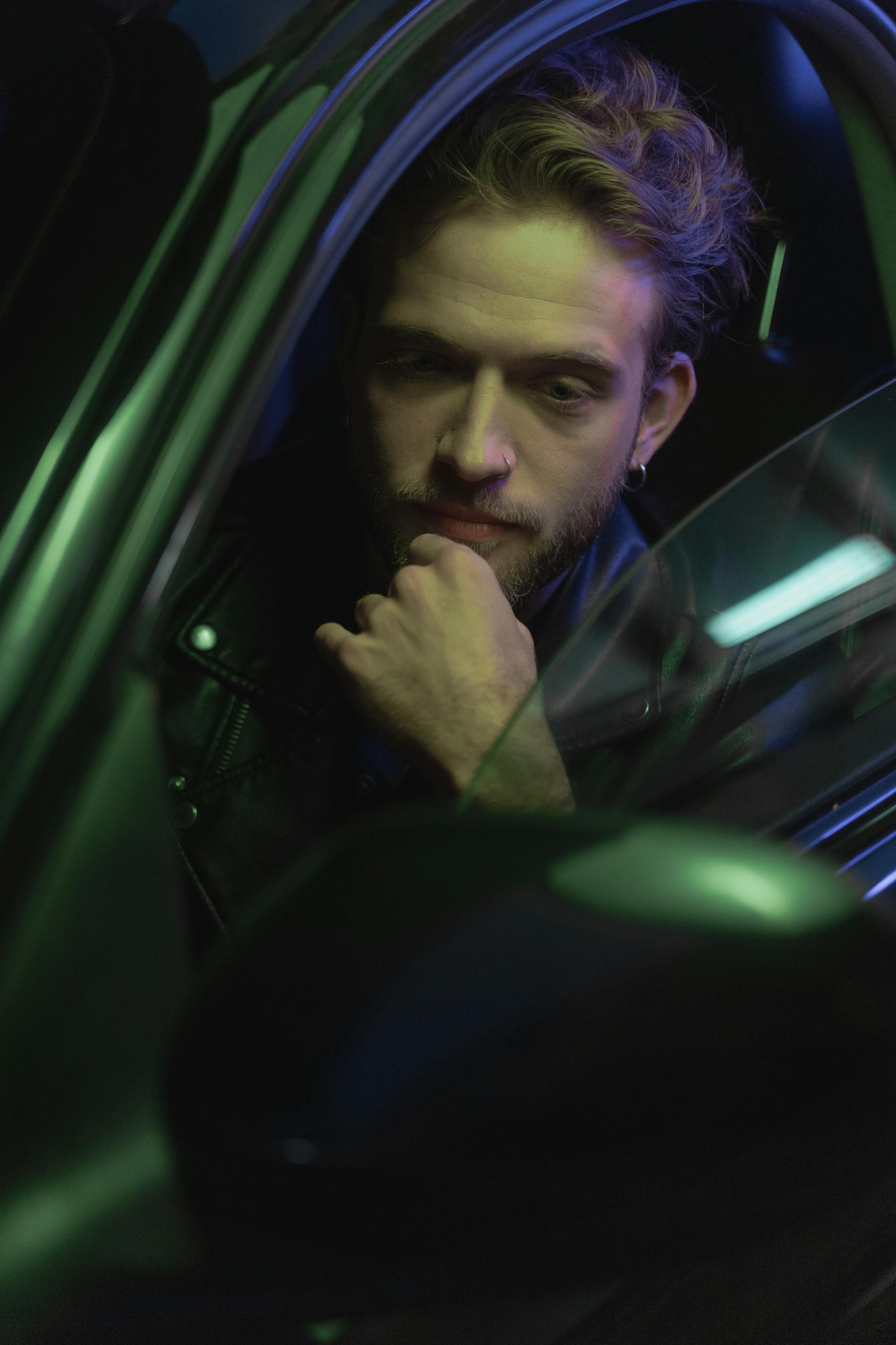 A serious man waiting in a car | Source: Pexels