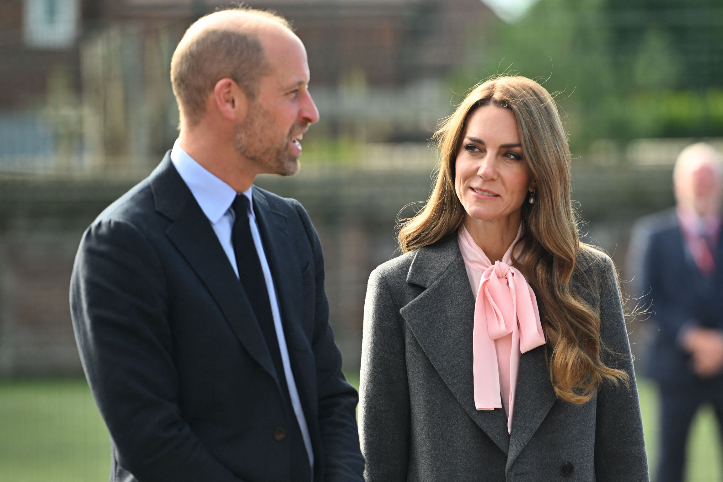 Catherine, Princess of Wales, together with Britain's Prince William, Prince of Wales, smiles during a visit to the Farnborough Road Infant and Junior School during a visit to Southport in north-west England on September 23, 2025. | Source: Getty Images