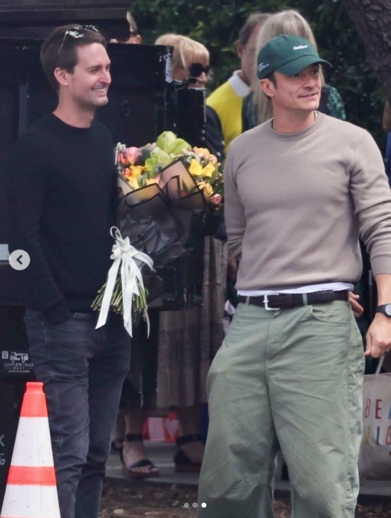 Evan Spiegel and Orlando Bloom pictured in a post dated June 8, 2025. | Source: Instagram/justjared