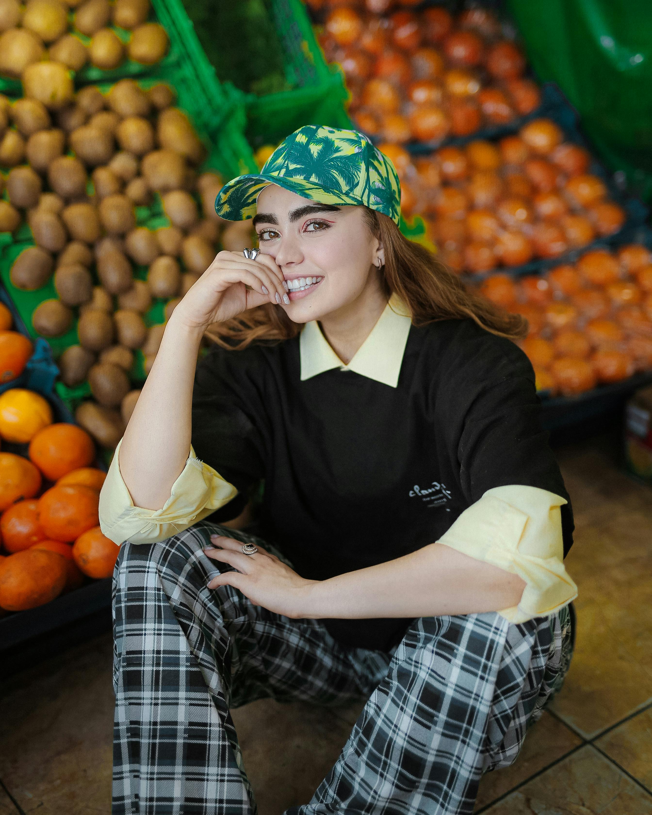A woman smiling at a grocery store | Source: Pexels