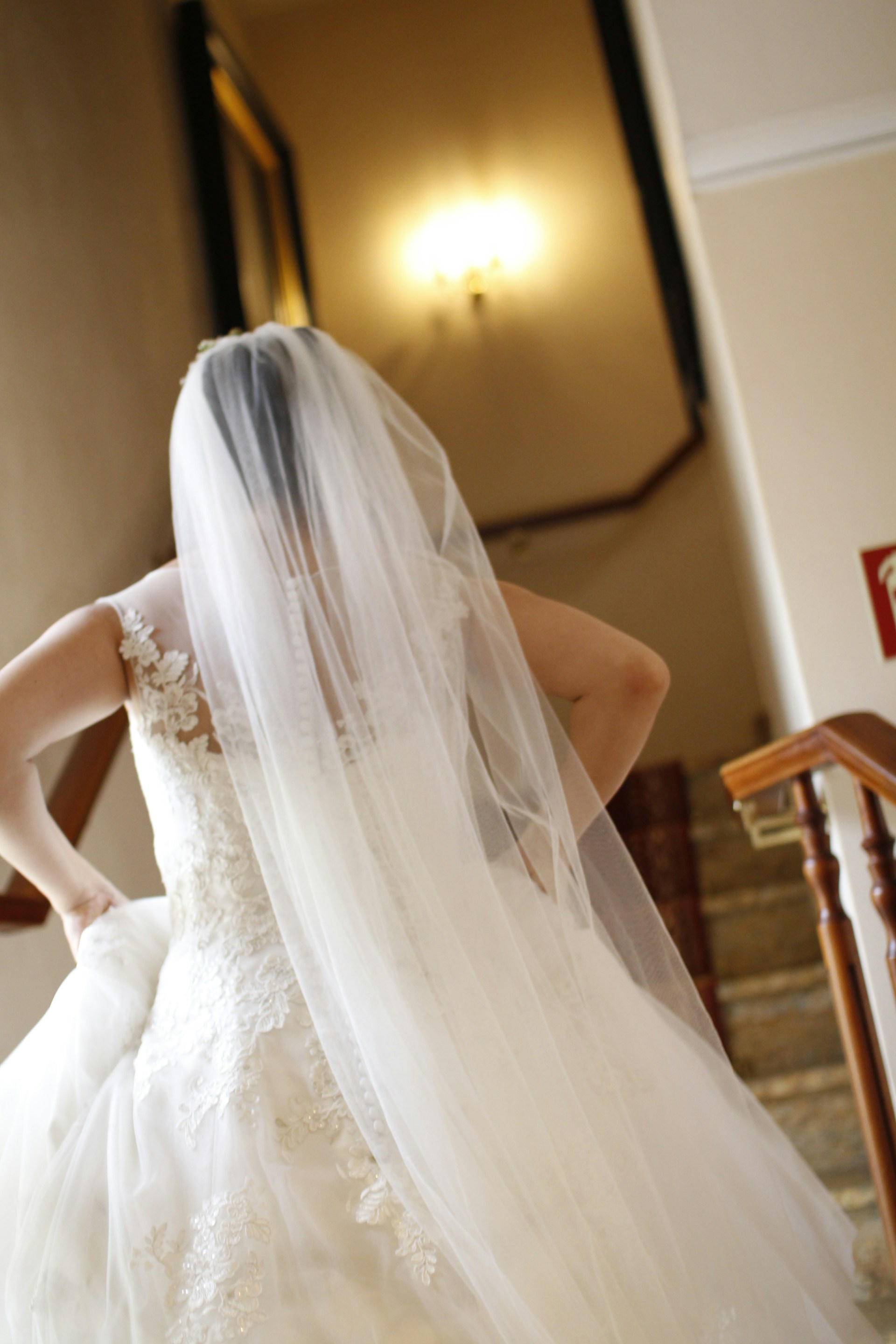 A frantic bride walking on the stairs | Source: Unsplash