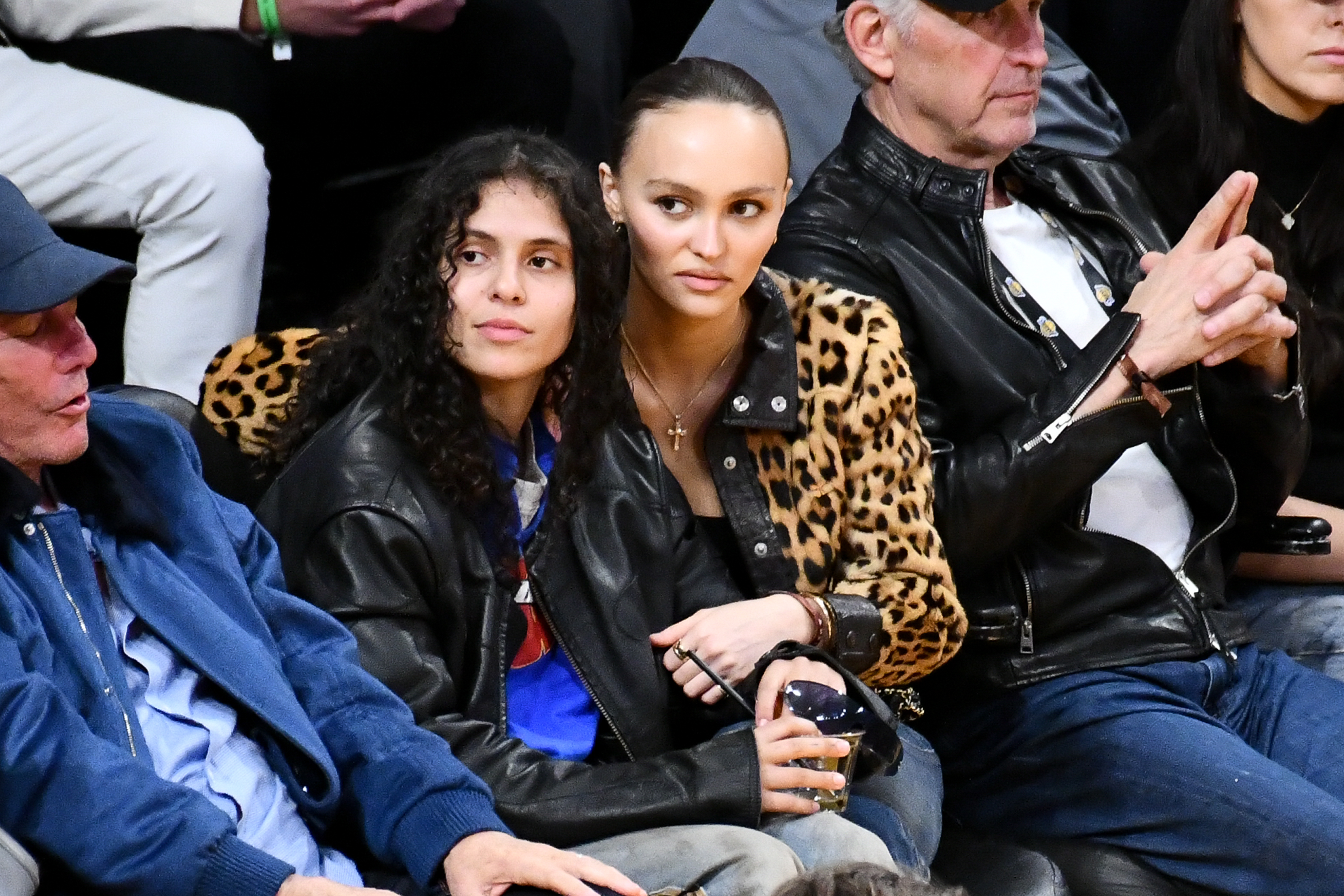 Lily-Rose Depp and 070 Shake attend a basketball game between the Los Angeles Lakers and the Minnesota Timberwolves at Crypto.com Arena on March 10, 2024, in Los Angeles, California. | Source: Getty Images