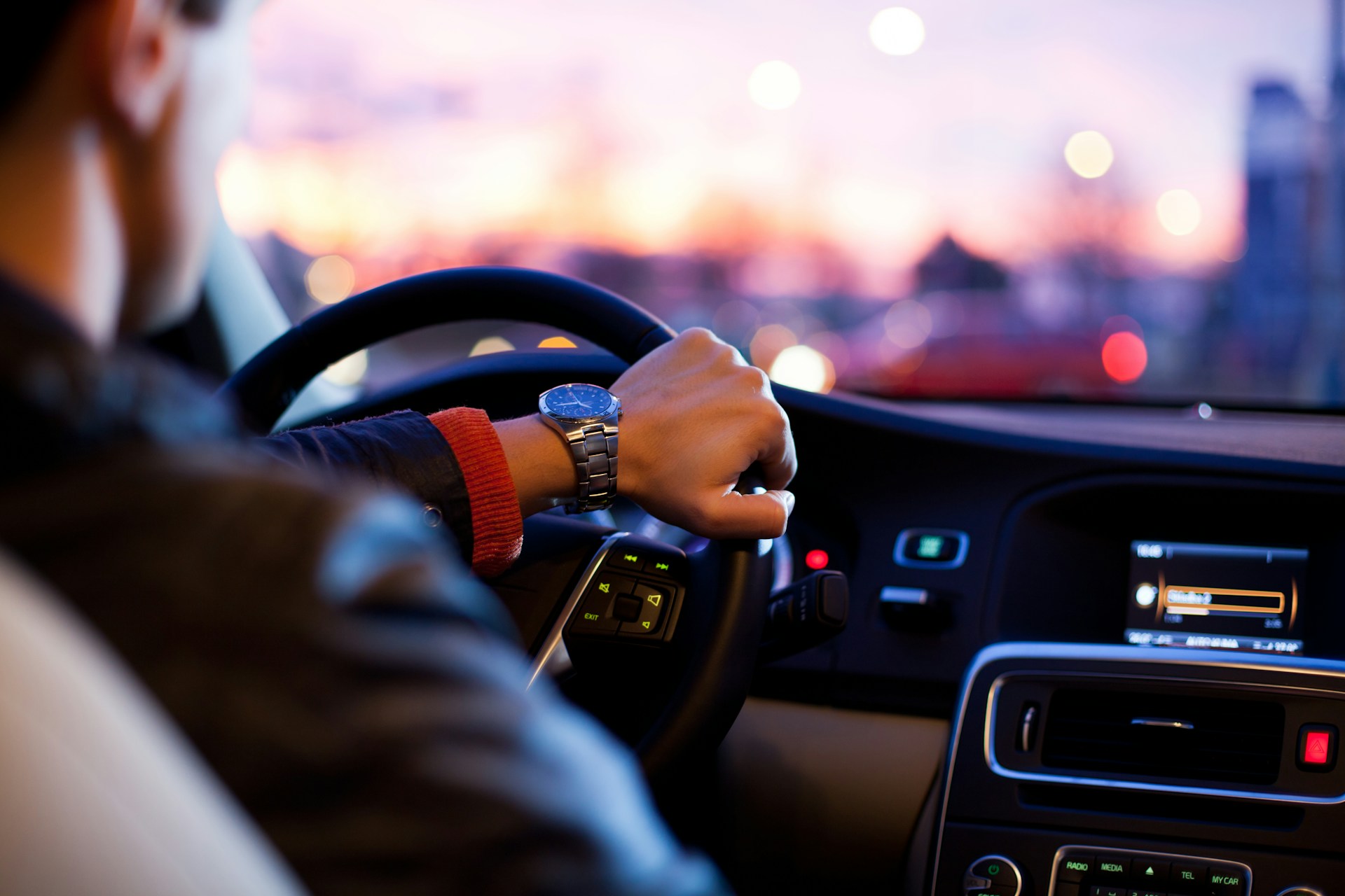 A man sitting in his car | Source: Unsplash
