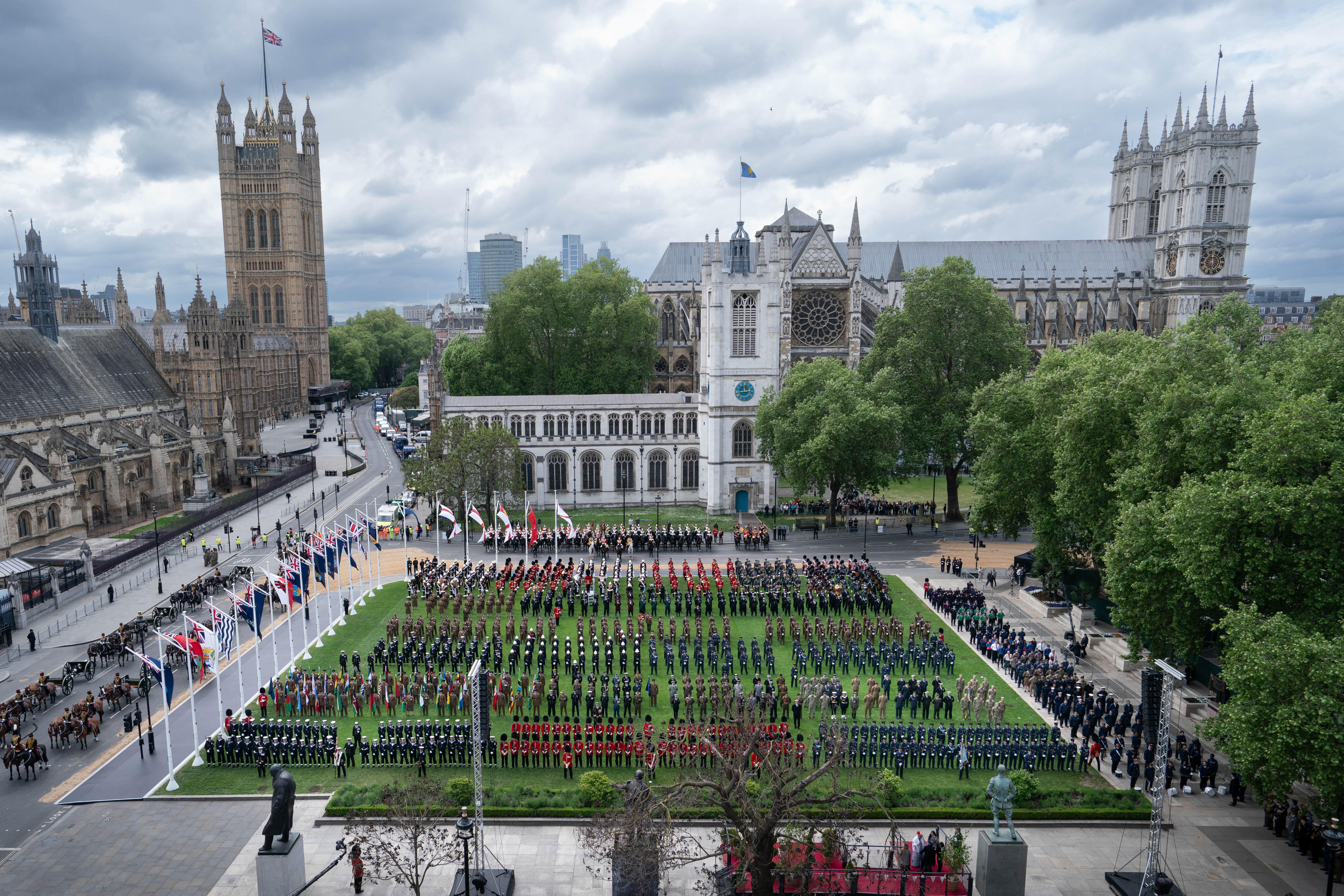 Military personnel take up their positions in Parliament Square ahead of a military procession a military procession marking the 80th anniversary of VE Day, and in honour of those who served during the Second World War on May 5, 2025, in London, England. | Source: Getty Images