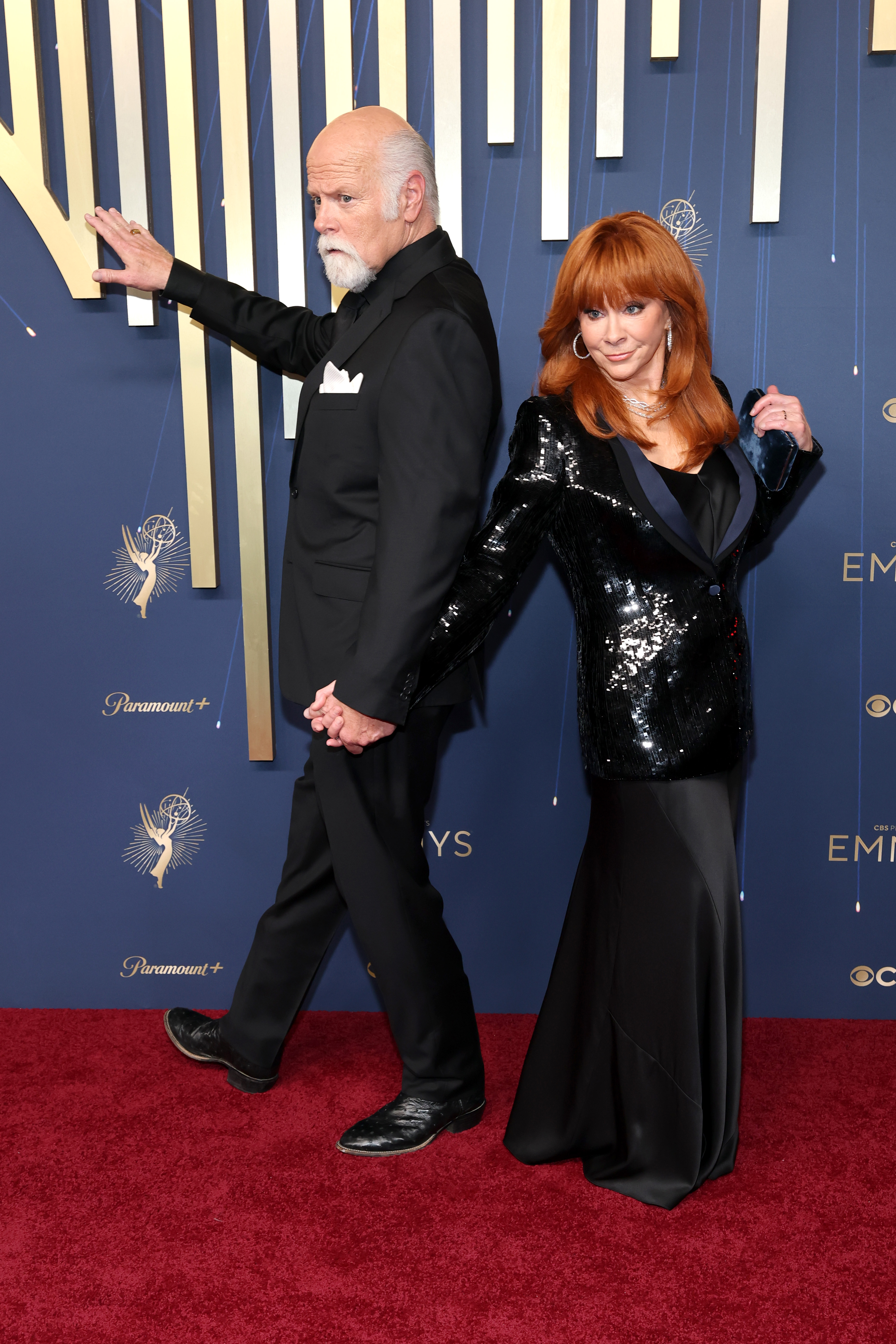 Rex Linn and Reba McEntire attend the 77th Primetime Emmy Awards at Peacock Theater on September 14, 2025, in Los Angeles, California. | Source: Getty Images