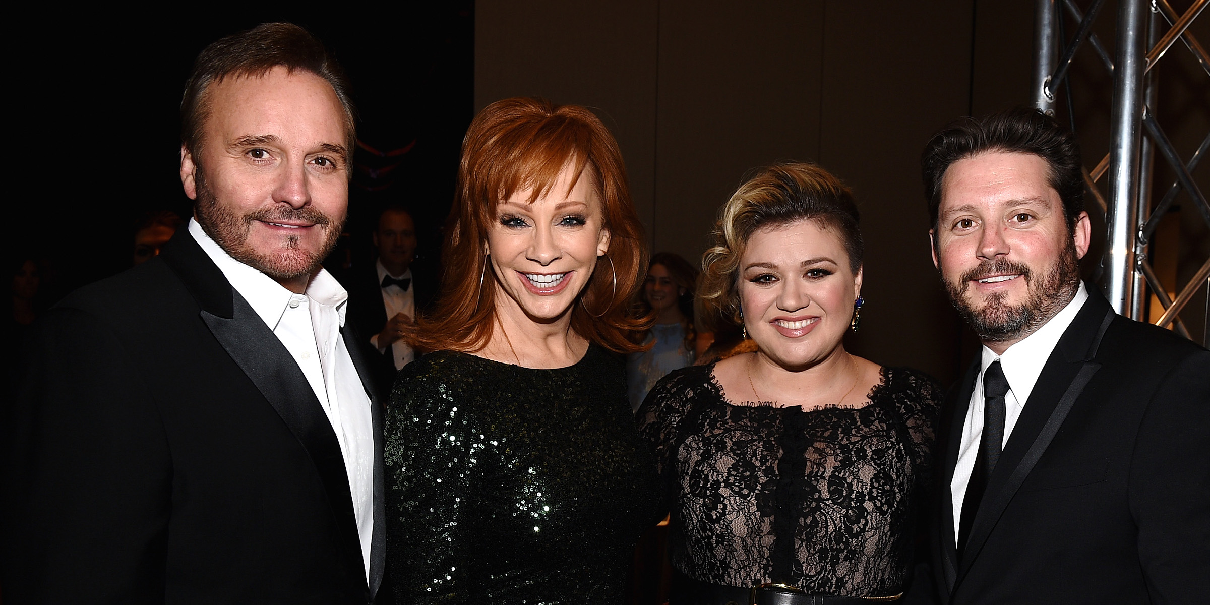 Narvel Blackstock, Reba McEntire, Kelly Clarkson, and Brandon Blackstock | Source: Getty Images