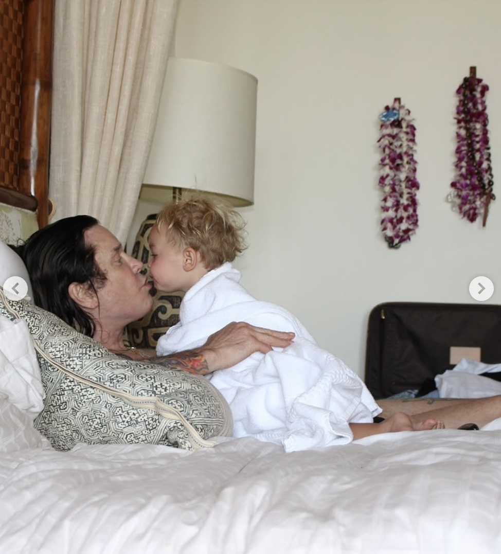 Ozzy Osbourne and his granddaughter share a kiss, posted on July 25, 2025 | Source: Instagram/lisastelly